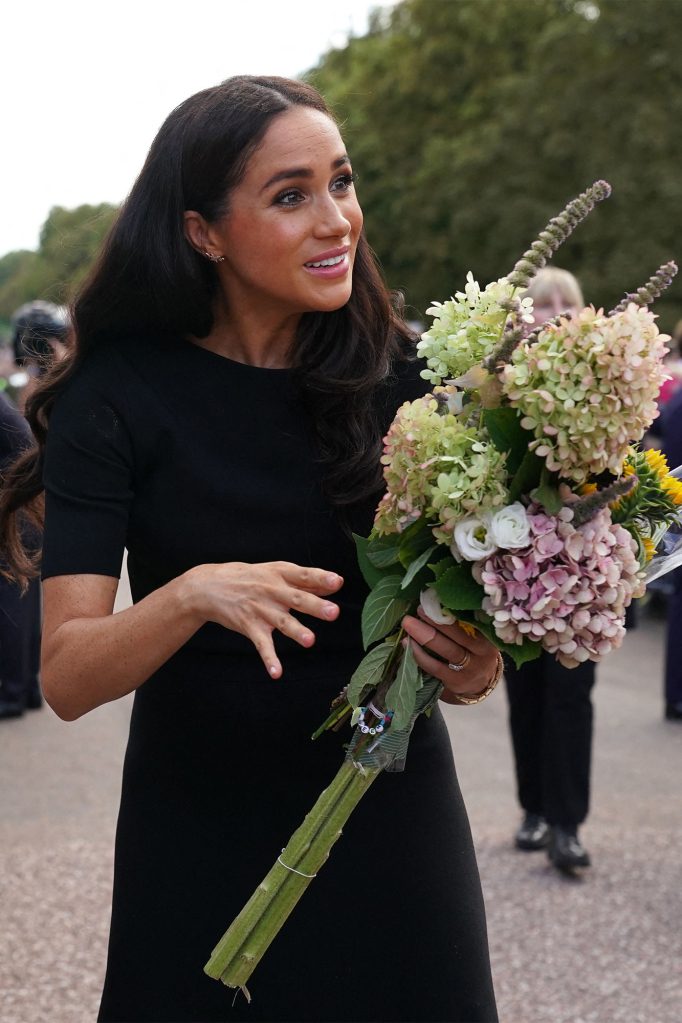 The Princess of Wales Kate Middleton, Prince of Wales Prince Willian and the Duke and Duchess of Sussex Prince Harry and Meghan Markle meet members of the public at Windsor Castle in Berkshire following the death of Queen Elizabeth II on Thursday.