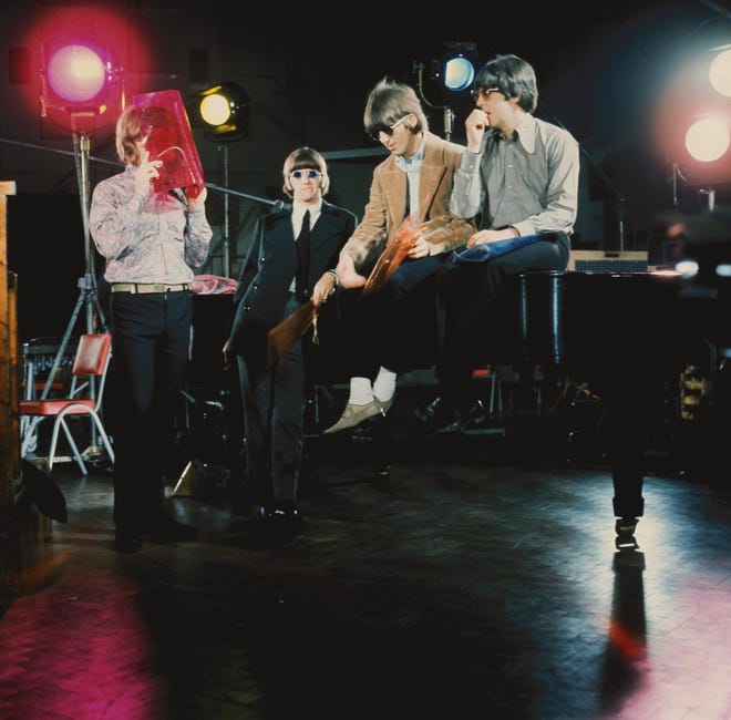 The Beatles (John Lennon, Ringo Starr, George Harrison and Paul McCartney) at Abbey Road Studios during filming "paperback writer" And the "rain" Promotional films on May 19, 1966.