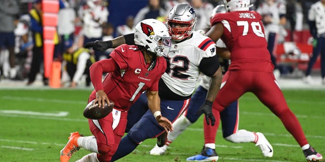 Kyler Murray #1 of the Arizona Cardinals fumbles with the ball against the New England Patriots during the first quarter of the game at State Farm Stadium on December 12, 2022 in Glendale, Arizona.